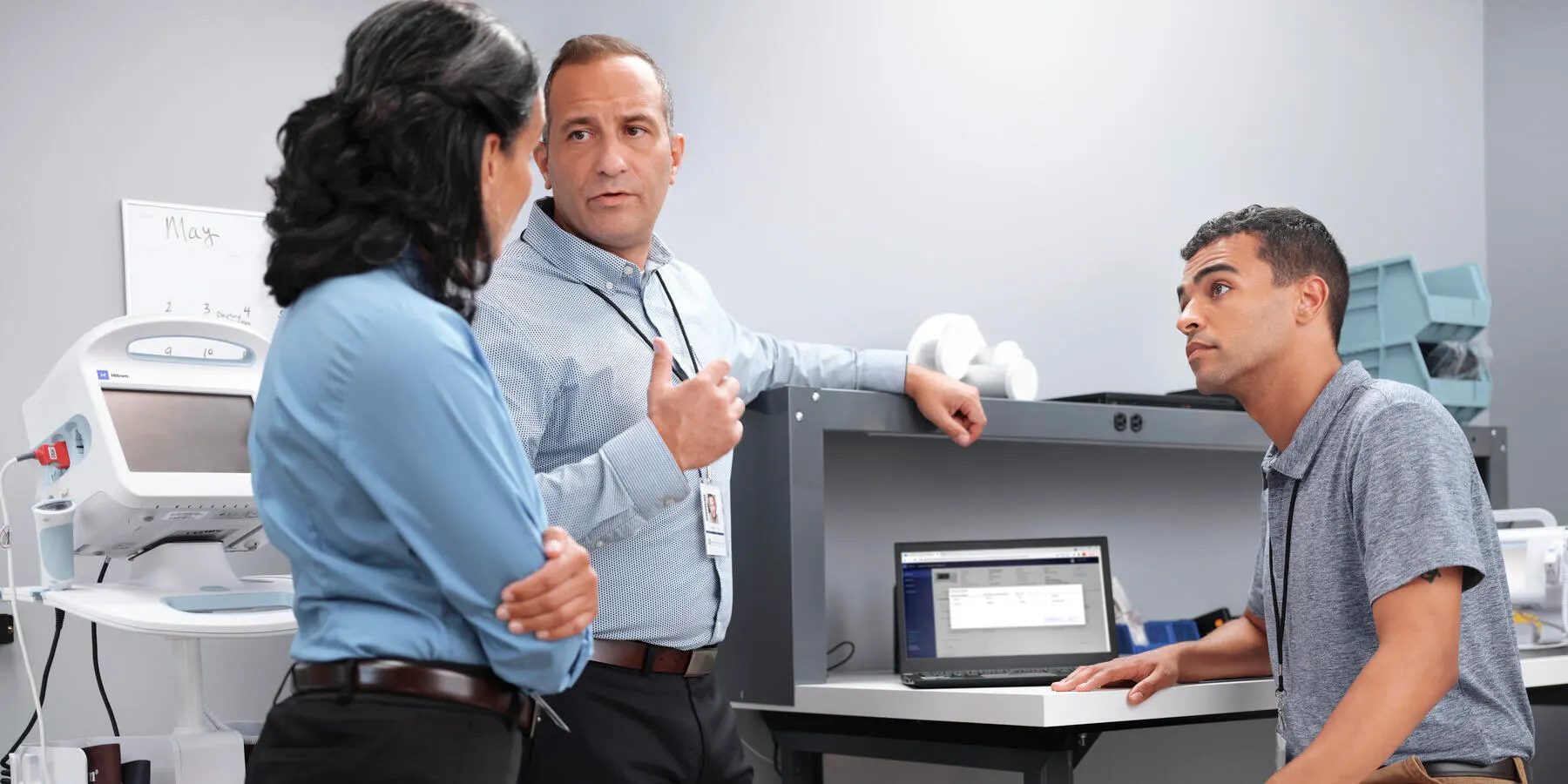 A team of biomedical engineers use Hillrom’s remote service management tool to discuss their maintenance priorities and plan for the week ahead.