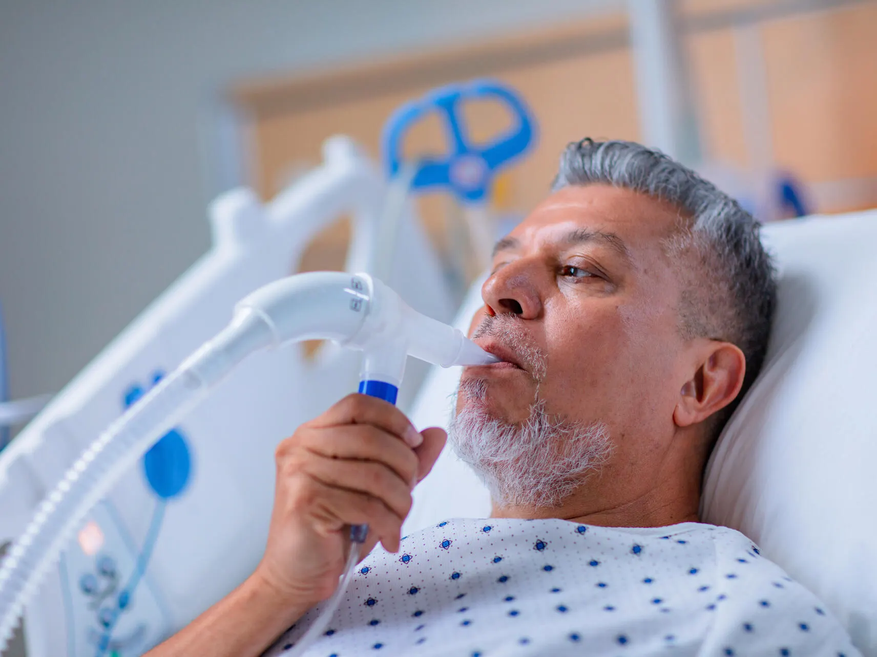 Patient breathing with respiratory asistance