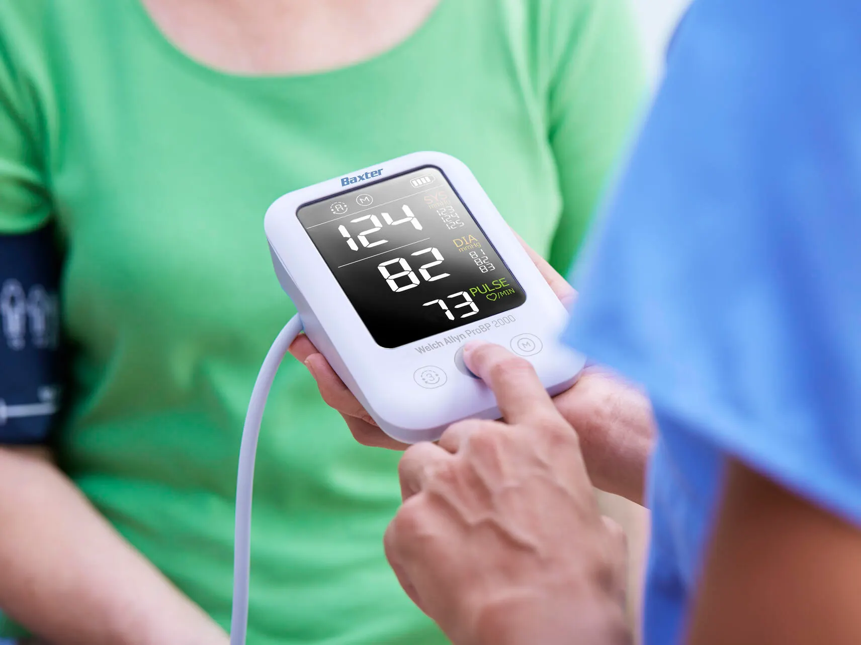 Healthcare professional taking a digital blood pressure reading from a patient on the ProBP 2000