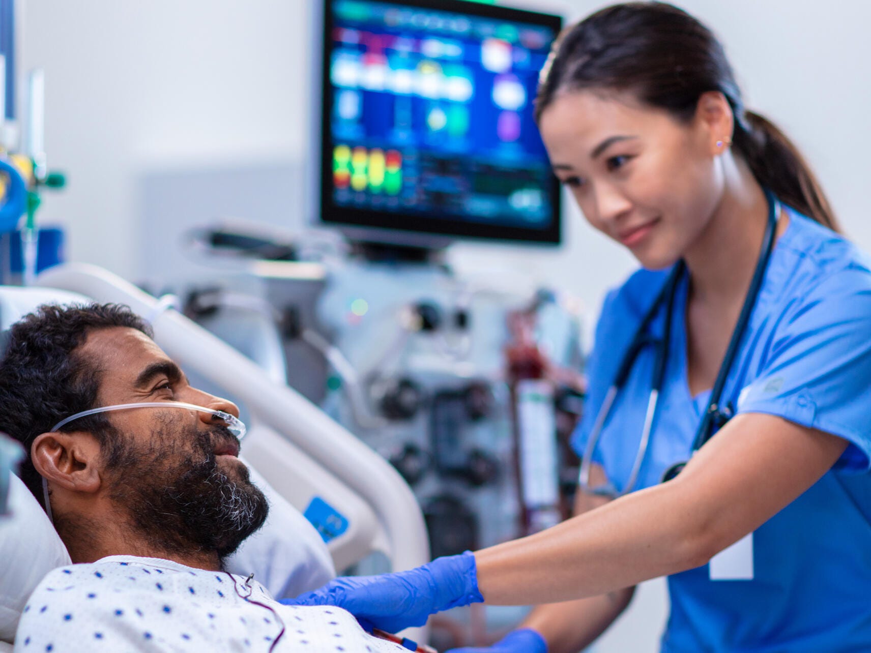 Nurse checks on patient