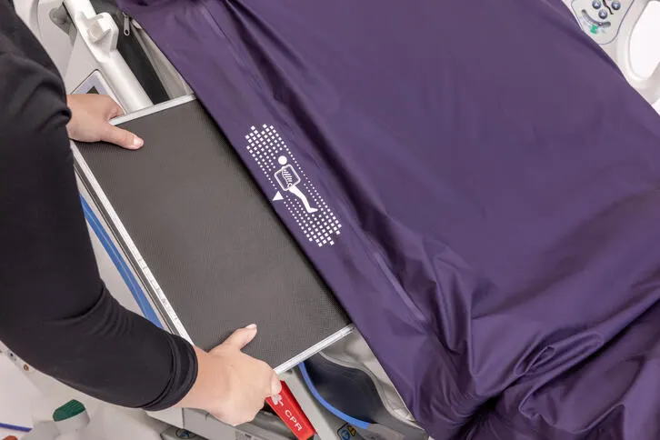 X-ray cassette being inserted into the Pro Plus Mattress