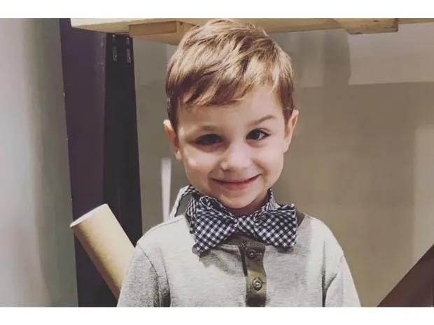 Bennett smiling at the camera