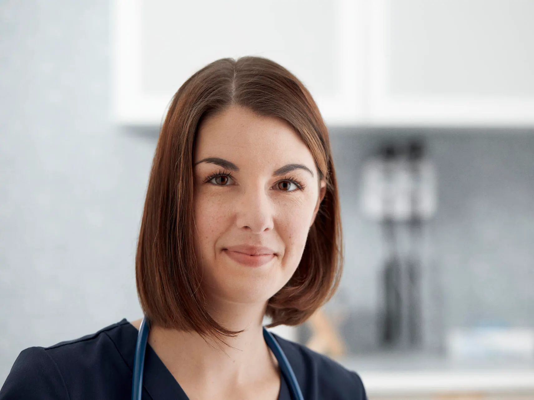 Nurse smiles at the camera