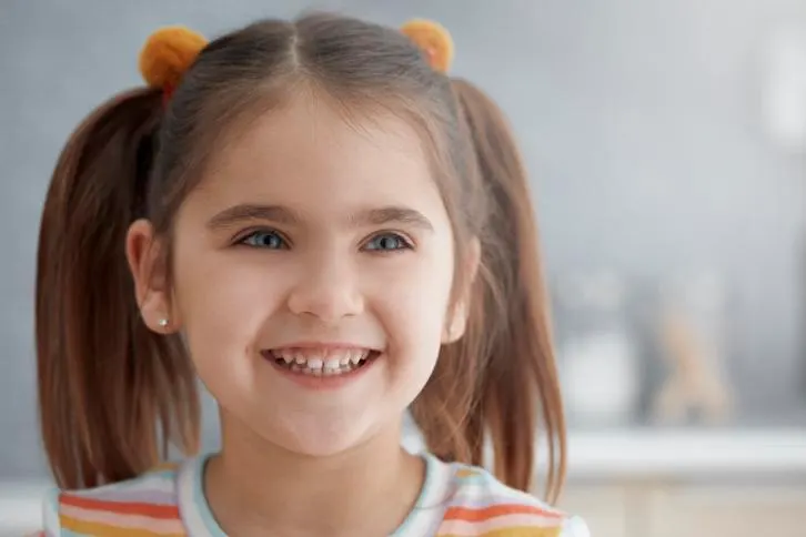 Child smiling at the camera