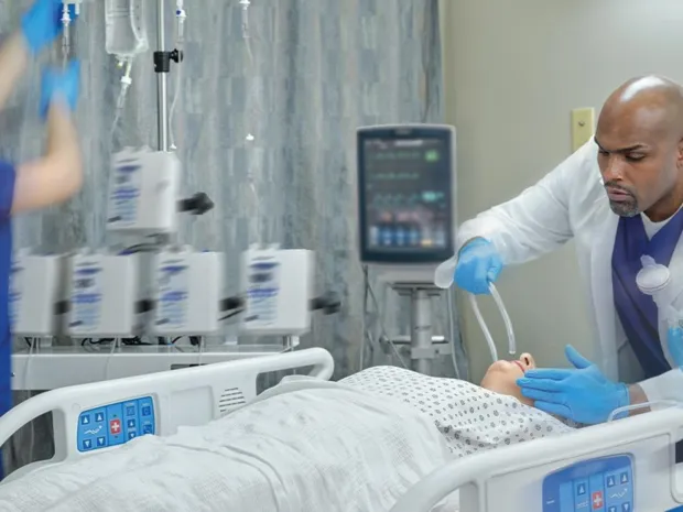 Clinician rapidly intubating a patient in an emergency situation