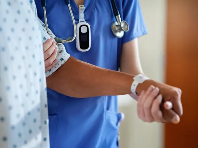 Connected care nurse with patient