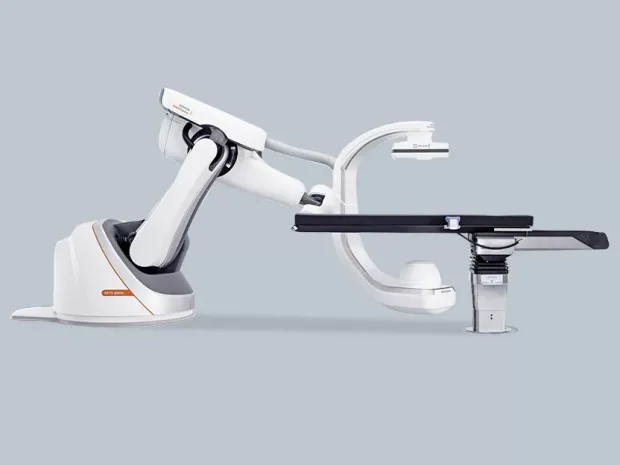 A TS7500 surgical table positioned in the Siemens ARTIS pheno and ARTIS zee ceiling angio solutions.