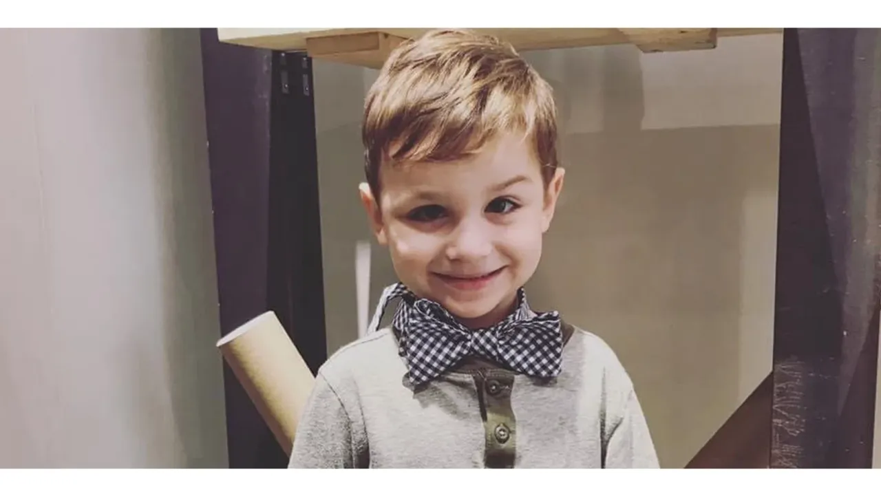 Bennett smiling at the camera