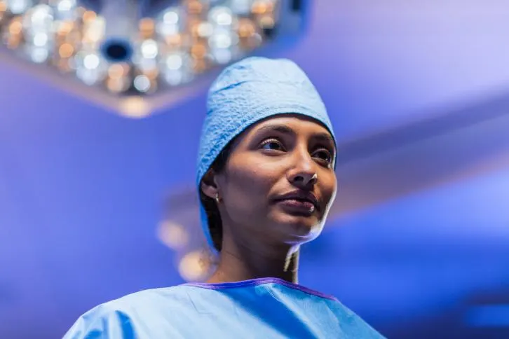 Surgeon looking at camera
