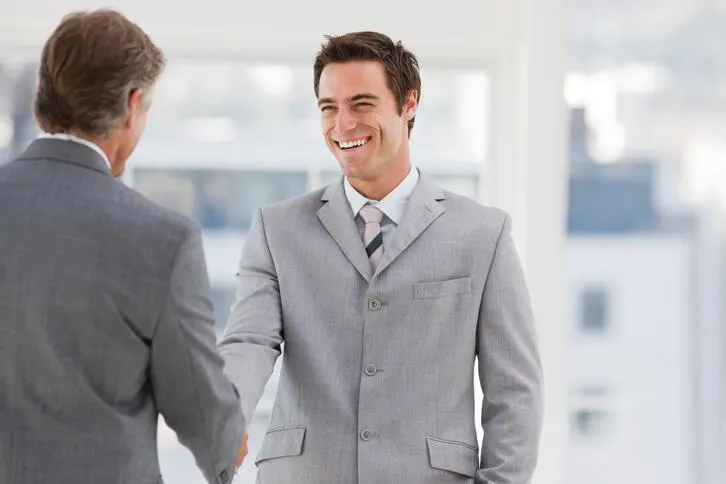 Business supplier shaking hand