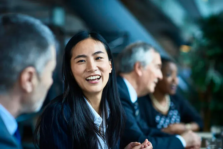 Baxter business woman enjoying conversation
