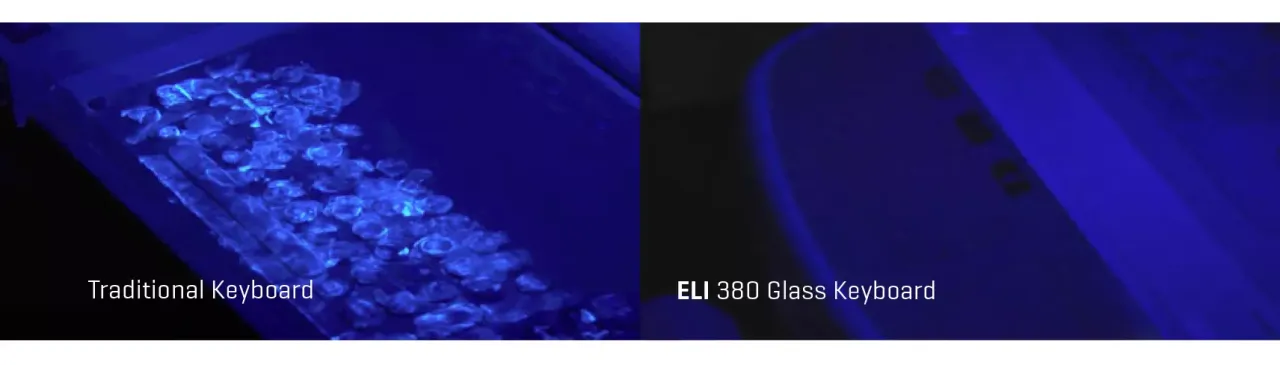 UV light showing bacteria on a traditional keyboard relative to an ELI 380 glass keyboard