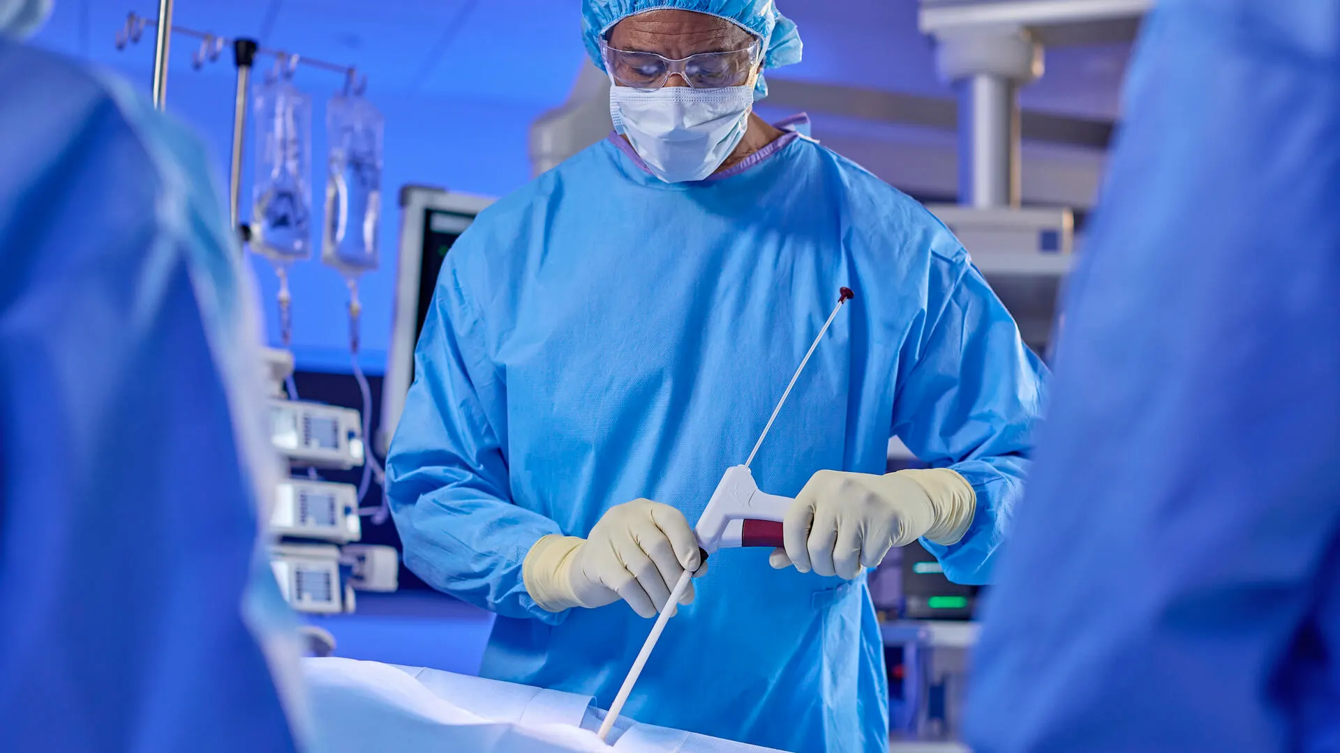 Actifuse being applied from an applicator during a surgery