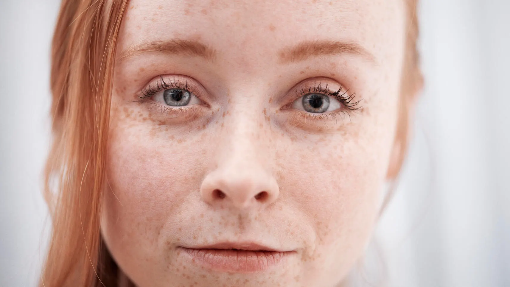 Close-up of woman's face lookng into the camera