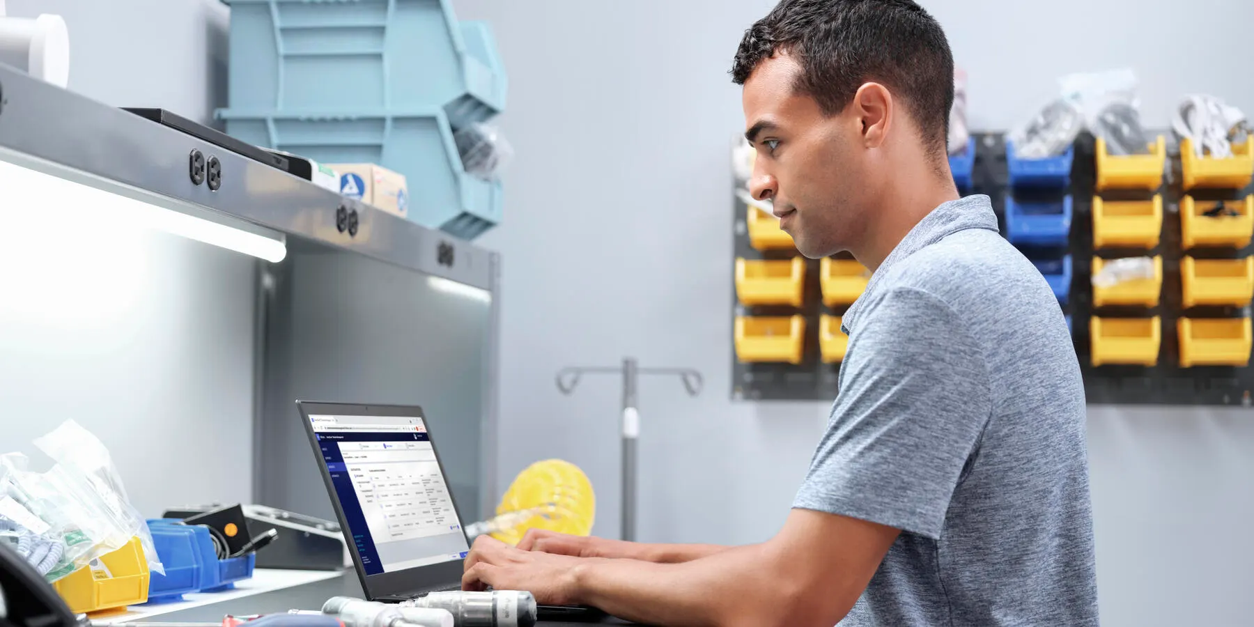 A biomed technician remotely managing devices from his workstation